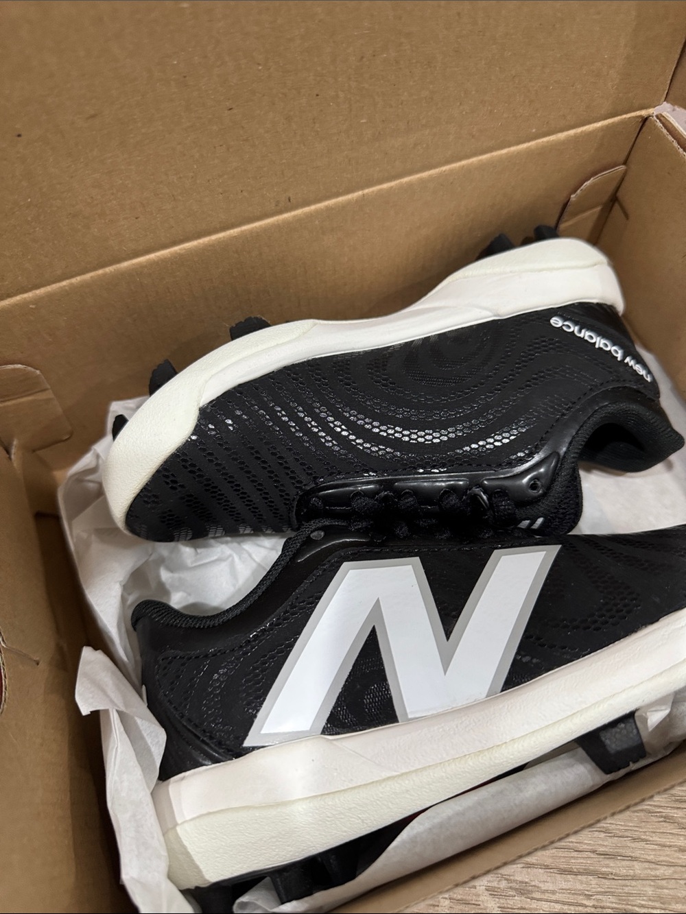 New Balance Kids Black and White Baseball Cleats 4040v7